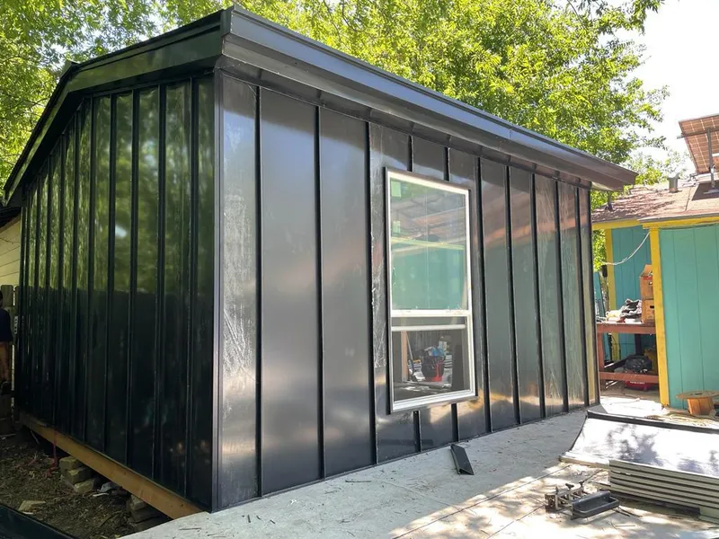 Black standing seam metal wall panels for Roof Inspection in Red Hill